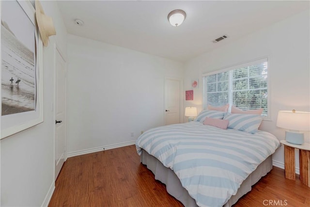 8647 Belmont St, Cypress, CA 90630 - bedroom with wood finished floors and baseboards