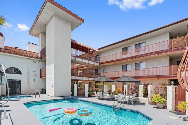 7625 Reseda Blvd Unit 302, Reseda, CA 91335 - community pool featuring a patio
