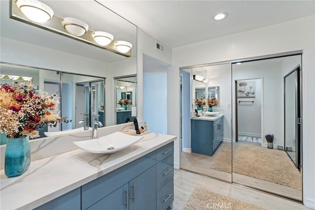 7625 Reseda Blvd Unit 302, Reseda, CA 91335 - full bath with vanity and wood finished floors