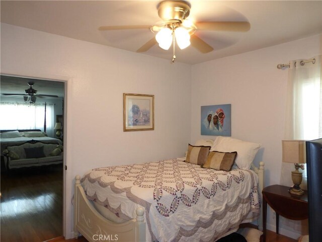 7106 Elmwood Rd, San Bernardino, CA 92404 - bedroom featuring wood finished floors and a ceiling fan