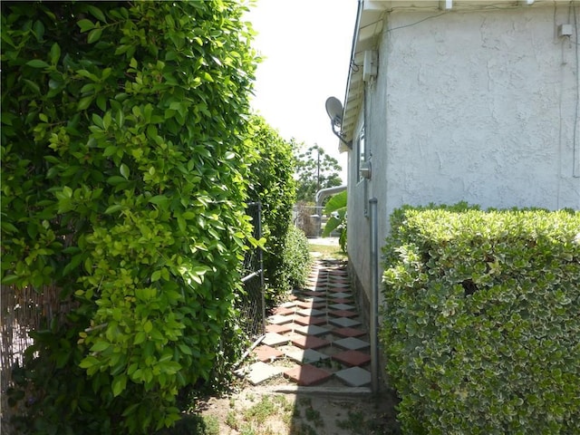 7106 Elmwood Rd, San Bernardino, CA 92404 - view of property exterior featuring stucco siding