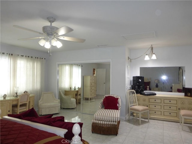 7106 Elmwood Rd, San Bernardino, CA 92404 - bedroom with a ceiling fan and light tile patterned floors
