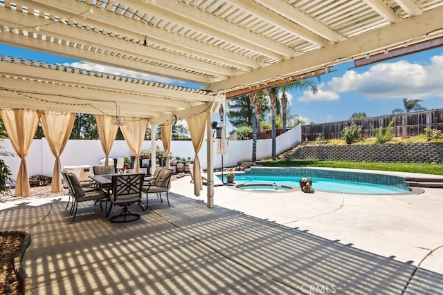 33180 Camino Piedra Rojo, Temecula, CA 92592 - fenced backyard with outdoor dining area, a patio, and a pool with connected hot tub