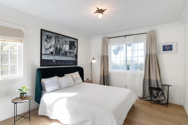 750 Breeze Hill Rd Unit 112, Vista, CA 92081 - bedroom featuring multiple windows, crown molding, and wood finished floors