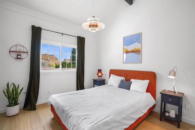 750 Breeze Hill Rd Unit 112, Vista, CA 92081 - bedroom featuring wood finished floors and crown molding