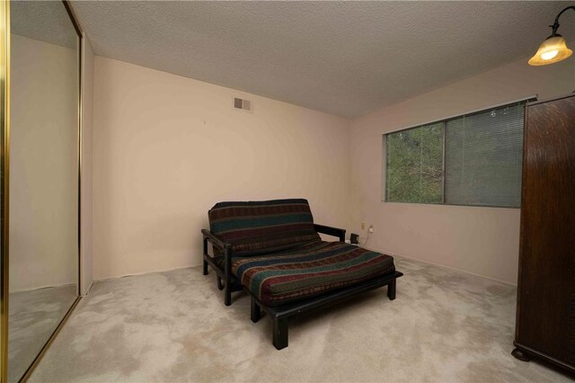 2527 Gibbons St, El Cajon, CA 92020 - sitting room featuring carpet and a textured ceiling