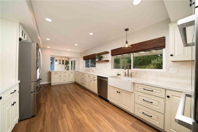 2527 Gibbons St, El Cajon, CA 92020 - kitchen featuring stainless steel appliances, backsplash, dark wood-style floors, light countertops, and recessed lighting
