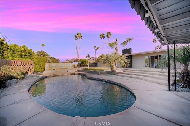 73466 Salt, Cedar, Palm Desert, CA 92260 - pool at dusk featuring a patio