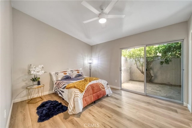 73466 Salt, Cedar, Palm Desert, CA 92260 - bedroom with access to outside, wood finished floors, vaulted ceiling, and ceiling fan