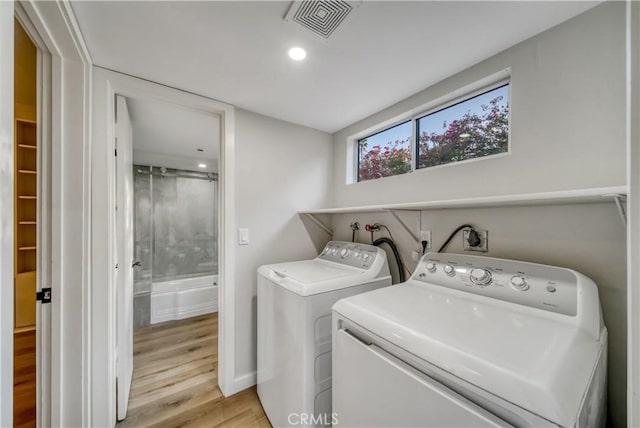 73466 Salt, Cedar, Palm Desert, CA 92260 - laundry room featuring washer and dryer, light wood-style floors, and recessed lighting