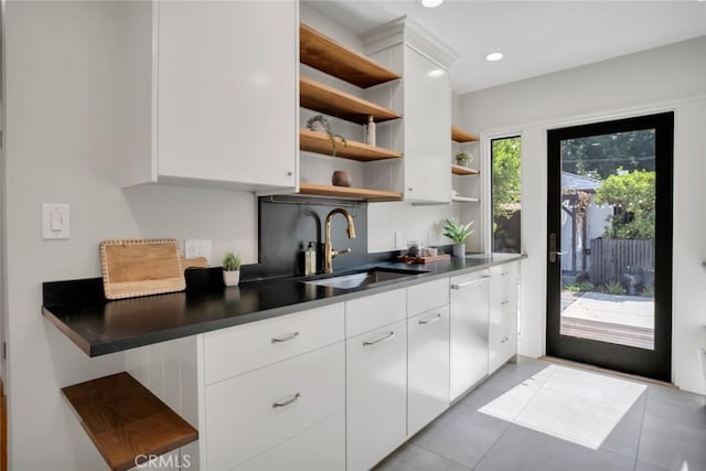 1000 N Chester Ave, Pasadena, CA 91104 - kitchen with open shelves, stainless steel dishwasher, white cabinetry, tile patterned flooring, and modern cabinets