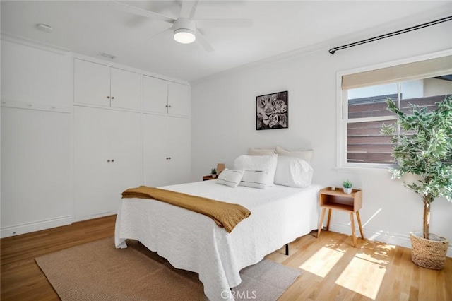 1000 N Chester Ave, Pasadena, CA 91104 - bedroom with light wood finished floors, a closet, and a ceiling fan
