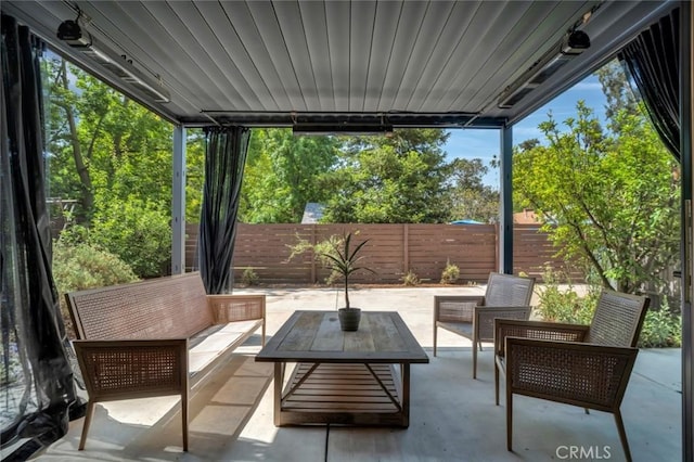 1000 N Chester Ave, Pasadena, CA 91104 - fenced backyard with outdoor lounge area and a patio area