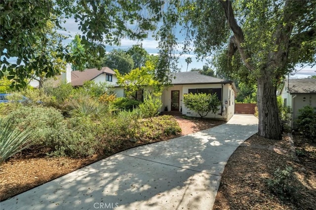 1000 N Chester Ave, Pasadena, CA 91104 - view of front of property featuring concrete driveway and stucco siding