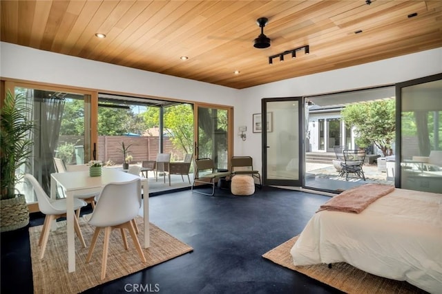 1000 N Chester Ave, Pasadena, CA 91104 - bedroom featuring access to exterior, wooden ceiling, concrete flooring, multiple windows, and recessed lighting