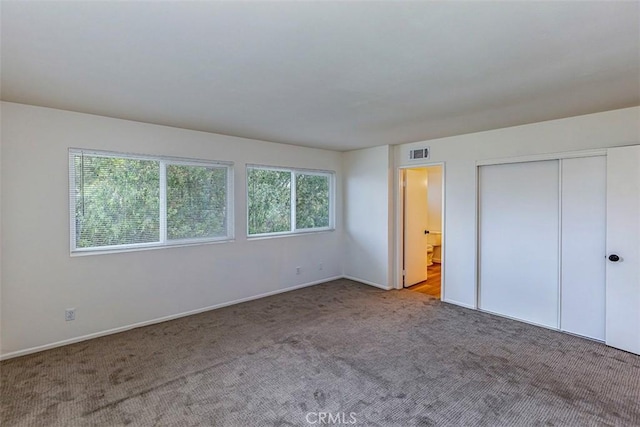 15015 Tacuba Dr, La Mirada, CA 90638 - unfurnished bedroom featuring carpet flooring, a closet, and connected bathroom