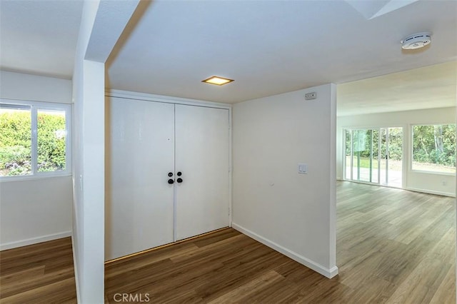 15015 Tacuba Dr, La Mirada, CA 90638 - entryway with baseboards and wood finished floors