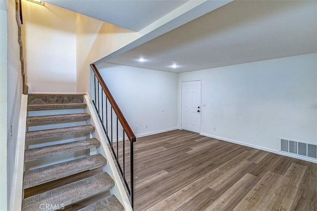 15015 Tacuba Dr, La Mirada, CA 90638 - stairs featuring wood finished floors and recessed lighting
