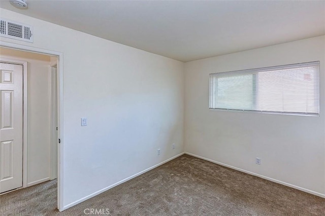 15015 Tacuba Dr, La Mirada, CA 90638 - carpeted empty room with baseboards and a smoke detector