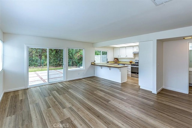 15015 Tacuba Dr, La Mirada, CA 90638 - unfurnished living room featuring wood finished floors