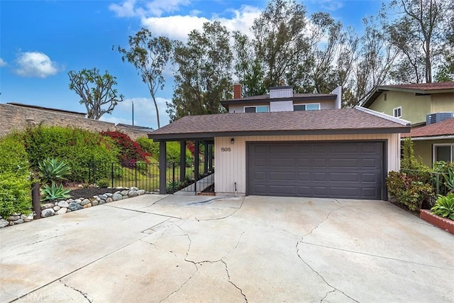 15015 Tacuba Dr, La Mirada, CA 90638 - garage featuring driveway