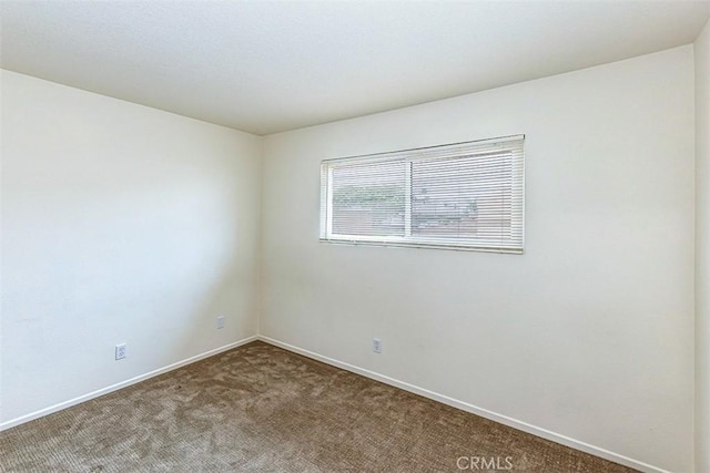 15015 Tacuba Dr, La Mirada, CA 90638 - unfurnished room with carpet flooring and baseboards