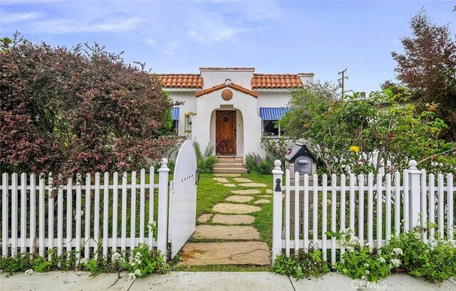 4260 Mcconnell Blvd, Los Angeles, CA 90066 - mediterranean / spanish home with a tiled roof and stucco siding