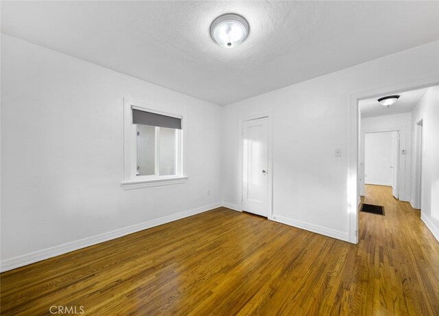 4260 Mcconnell Blvd, Los Angeles, CA 90066 - unfurnished bedroom featuring wood finished floors and a closet