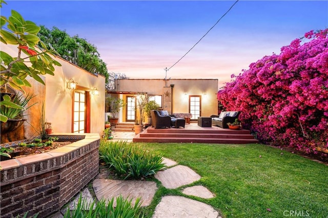 4260 Mcconnell Blvd, Los Angeles, CA 90066 - view of green lawn with outdoor lounge area, a deck, and french doors