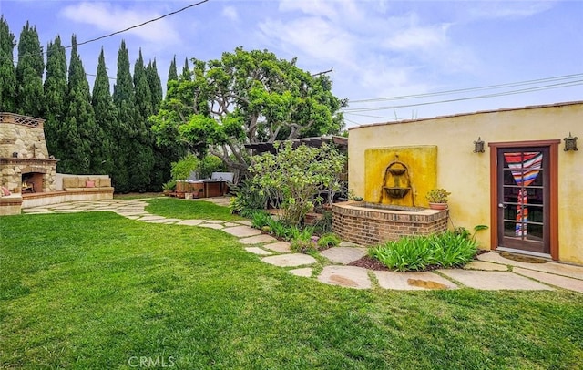4260 Mcconnell Blvd, Los Angeles, CA 90066 - view of grassy yard with an outdoor stone fireplace