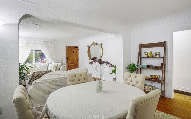4260 Mcconnell Blvd, Los Angeles, CA 90066 - dining room with wood finished floors and baseboards