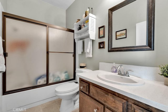 6323 Reseda Blvd Unit 13, Tarzana, CA 91335 - bathroom with vanity, combined bath / shower with glass door, and tile patterned flooring