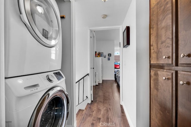 6323 Reseda Blvd Unit 13, Tarzana, CA 91335 - laundry area with estacked washer and dryer and wood finished floors