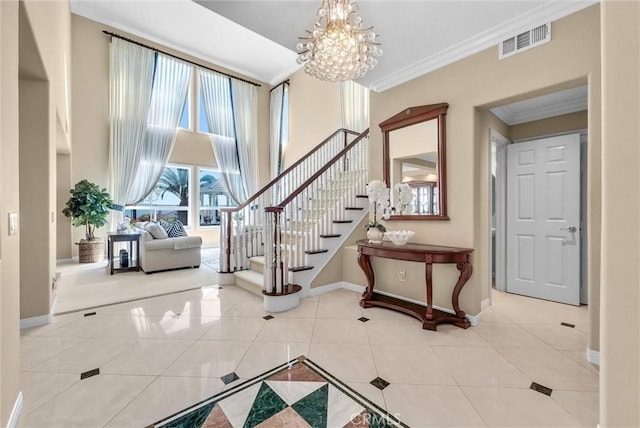 1411 W Boros Ct, La Habra, CA 90631 - tiled entryway featuring crown molding, a chandelier, stairs, and a towering ceiling
