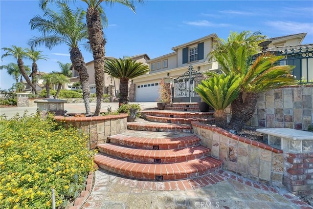 1411 W Boros Ct, La Habra, CA 90631 - view of front facade with driveway and an attached garage