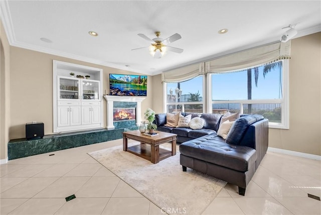 1411 W Boros Ct, La Habra, CA 90631 - living area featuring ornamental molding, light tile patterned flooring, ceiling fan, a premium fireplace, and recessed lighting