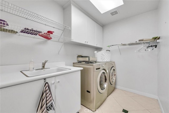 1411 W Boros Ct, La Habra, CA 90631 - laundry room featuring cabinet space, washer and clothes dryer, and light tile patterned flooring