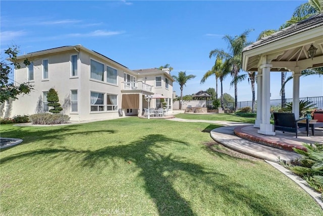 1411 W Boros Ct, La Habra, CA 90631 - view of green lawn with a gazebo, a balcony, and a patio area
