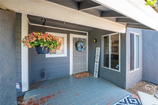 11359 Dole Ct, Riverside, CA 92505 - entrance to property with stucco siding and a porch