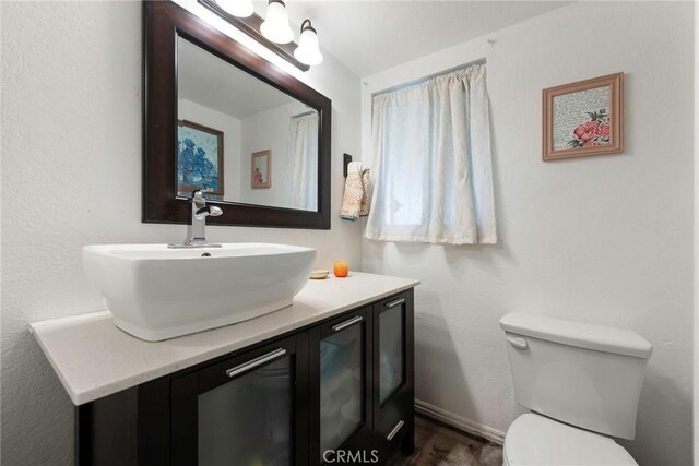 11359 Dole Ct, Riverside, CA 92505 - bathroom featuring vanity and a chandelier