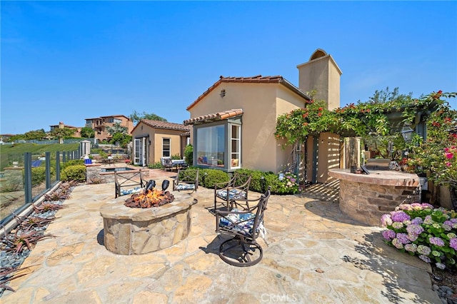 15 Sarteano Dr, Newport Coast, CA 92657 - view of patio featuring a fire pit