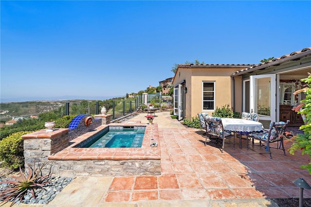 15 Sarteano Dr, Newport Coast, CA 92657 - view of pool with an in-ground hot tub, a patio area, and outdoor dining space