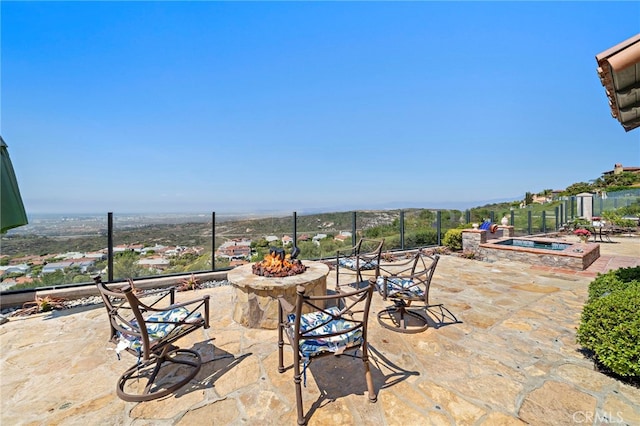 15 Sarteano Dr, Newport Coast, CA 92657 - view of patio / terrace with an outdoor fire pit and an in-ground hot tub