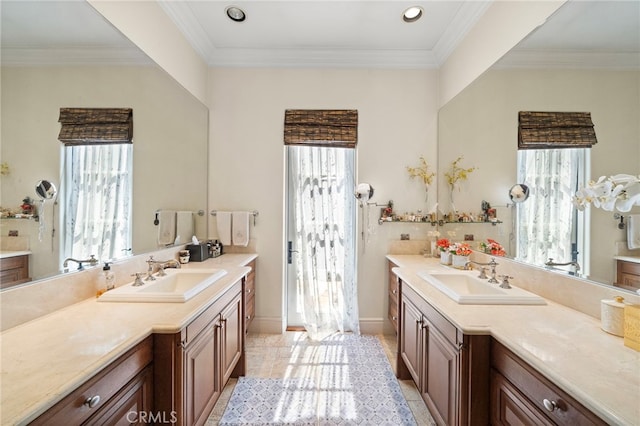 15 Sarteano Dr, Newport Coast, CA 92657 - full bathroom featuring two vanities, crown molding, and recessed lighting