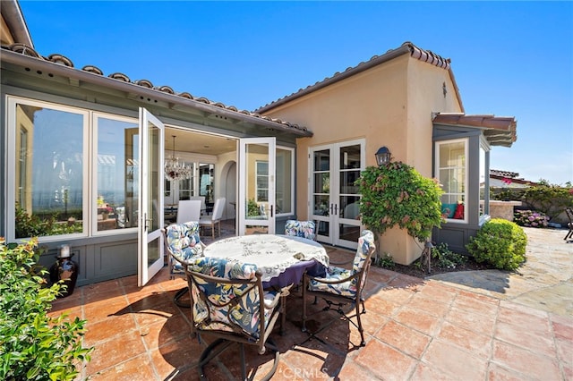 15 Sarteano Dr, Newport Coast, CA 92657 - view of patio with french doors and outdoor dining area