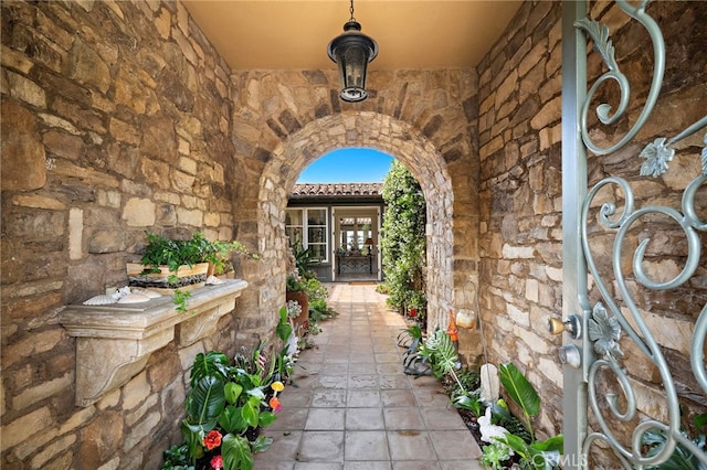 15 Sarteano Dr, Newport Coast, CA 92657 - view of exterior entry featuring stone siding