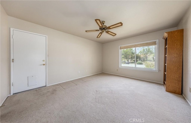 1144 Jasmine St, Redlands, CA 92374 - empty room featuring a ceiling fan and carpet flooring