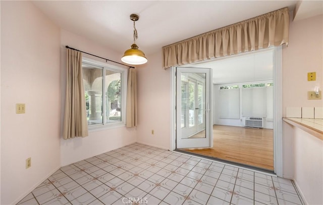 1144 Jasmine St, Redlands, CA 92374 - spare room with healthy amount of natural light and light flooring