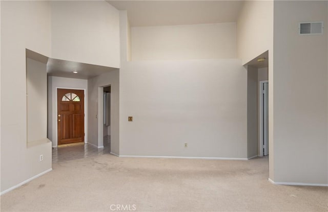 1144 Jasmine St, Redlands, CA 92374 - entrance foyer with light colored carpet and a high ceiling