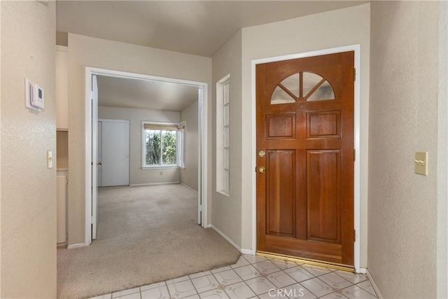 1144 Jasmine St, Redlands, CA 92374 - foyer entrance with light colored carpet and baseboards